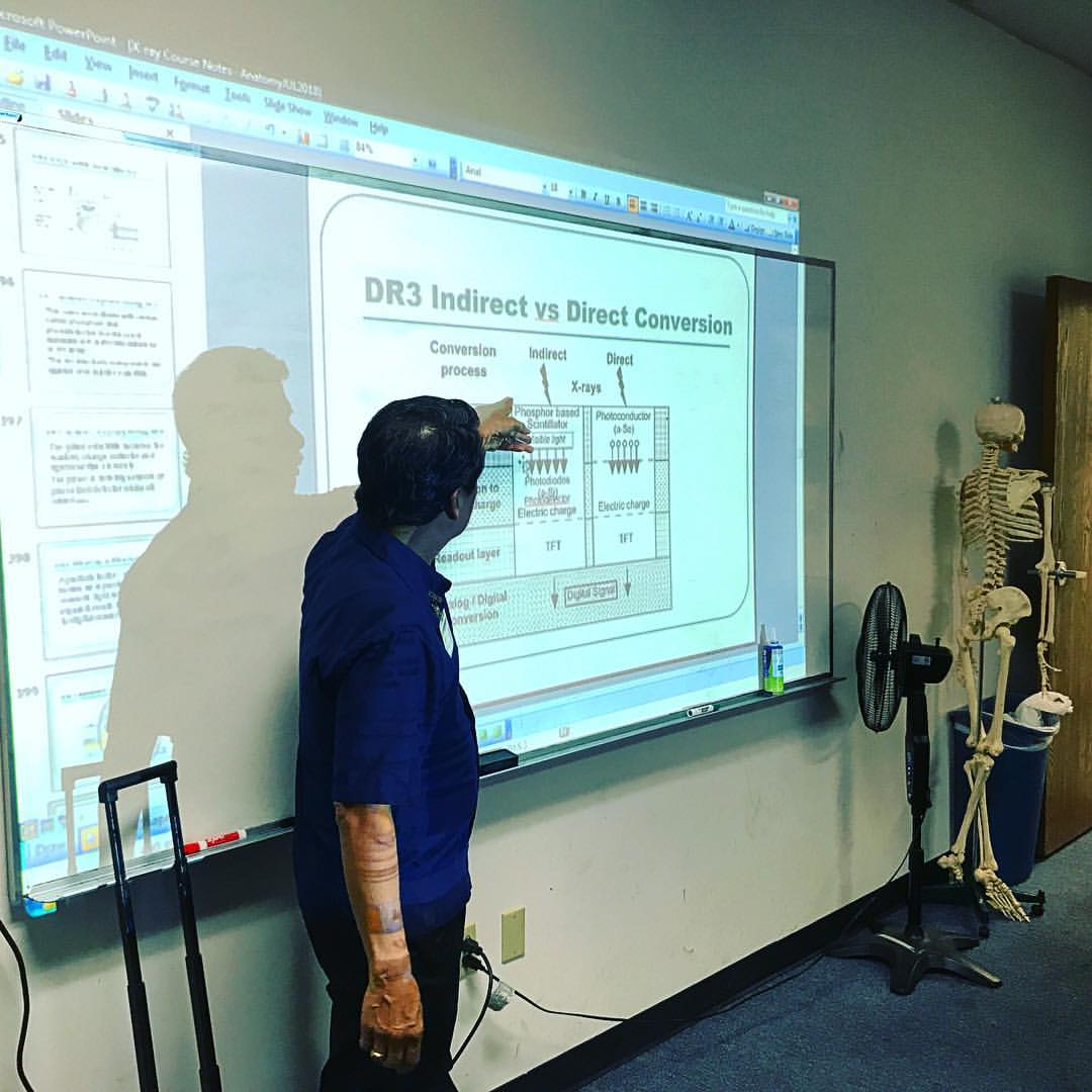 X-ray instructor Ed Fernandez, BA, ARRT, teaching in our small X-ray Tech classes